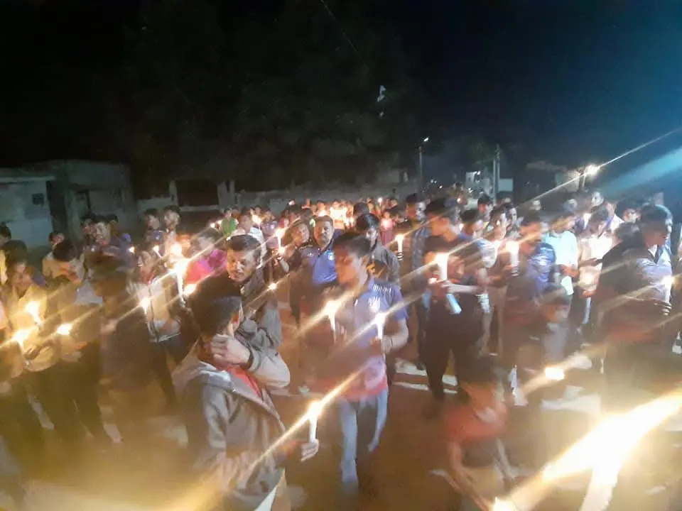 Night candle march, large crowd