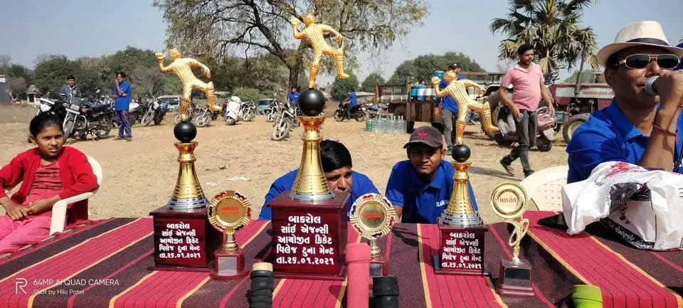 Trophies on table, cricket tournament