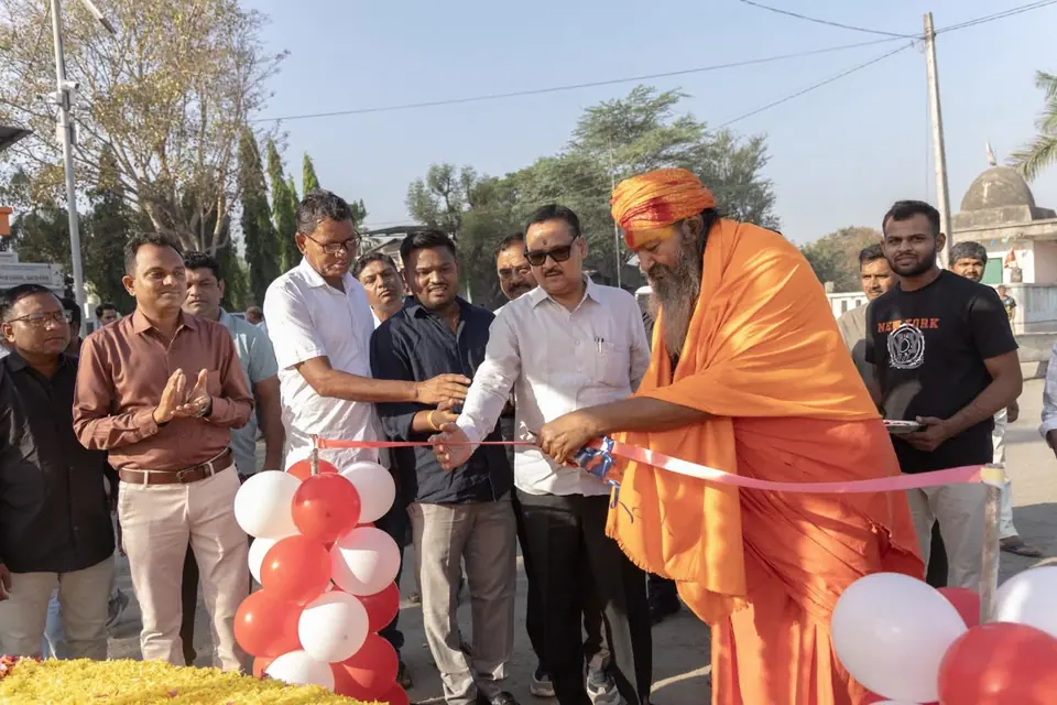 Ribbon cutting with sadhu, balloons