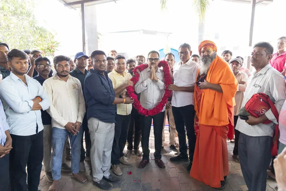 Group with sadhu, garland