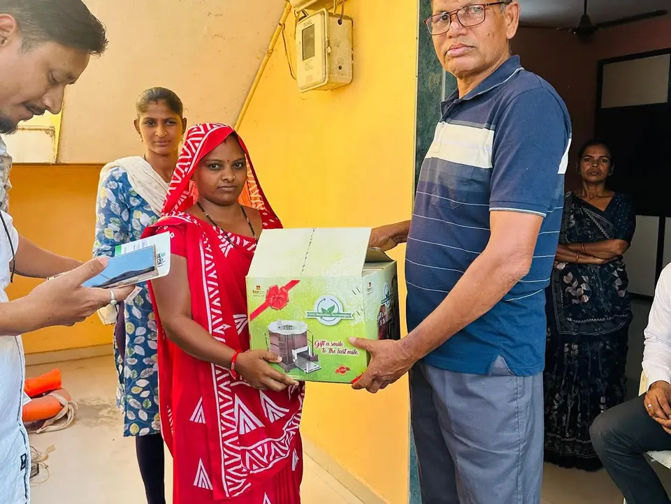Kit/box handed to woman