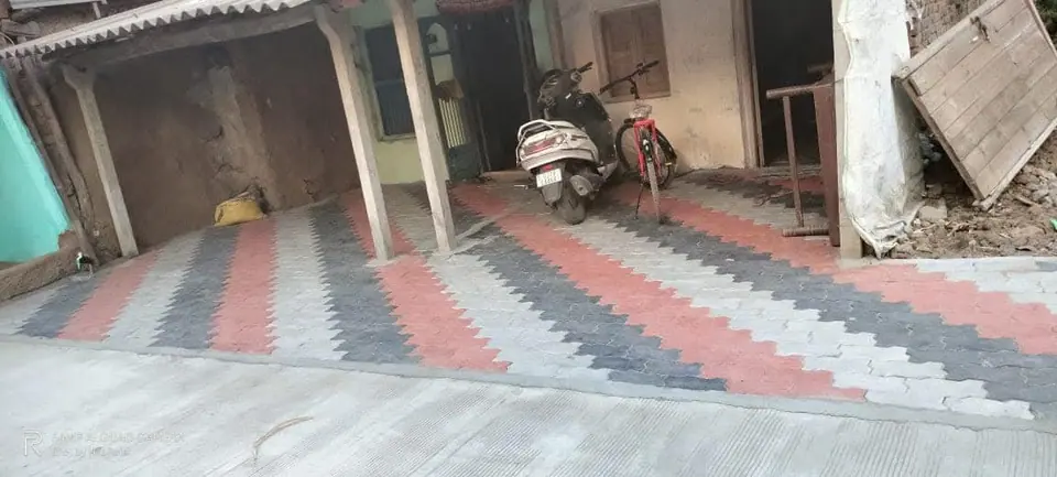 Paver-block lane in front of houses