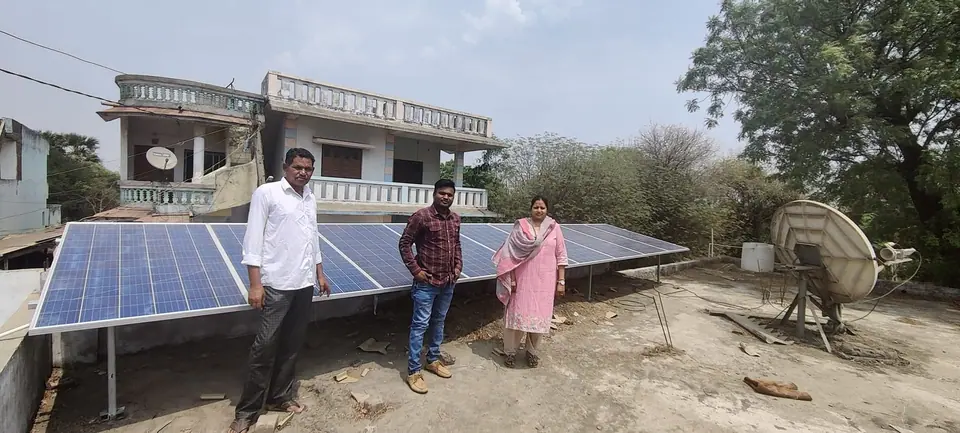 Rooftop solar panels with people