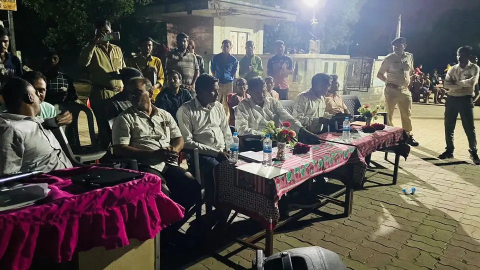 Night meeting with officials at table