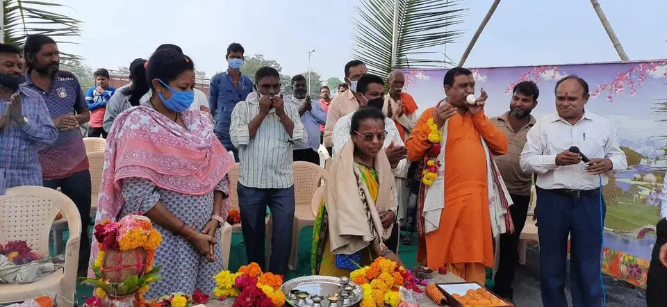 Guests with sadhu, puja items