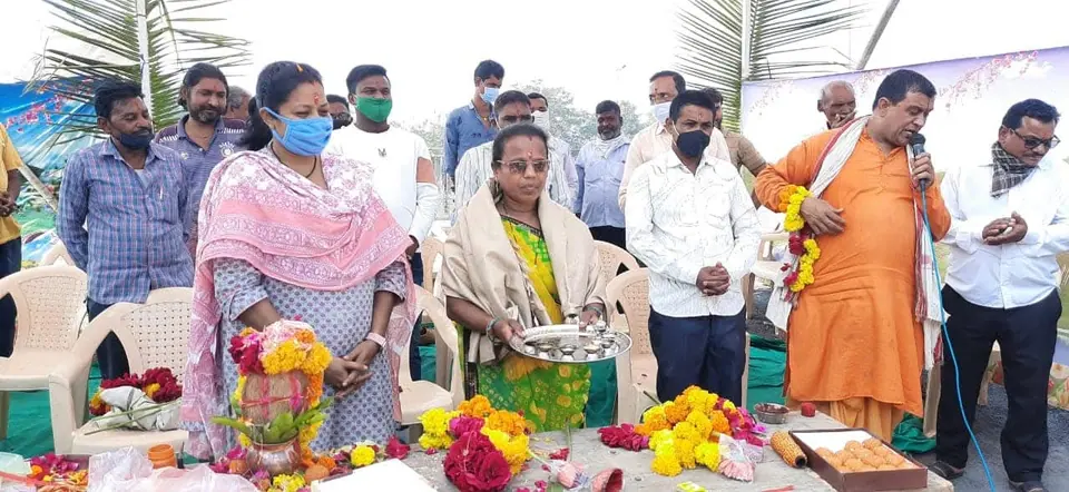 Guests with sadhu, puja items