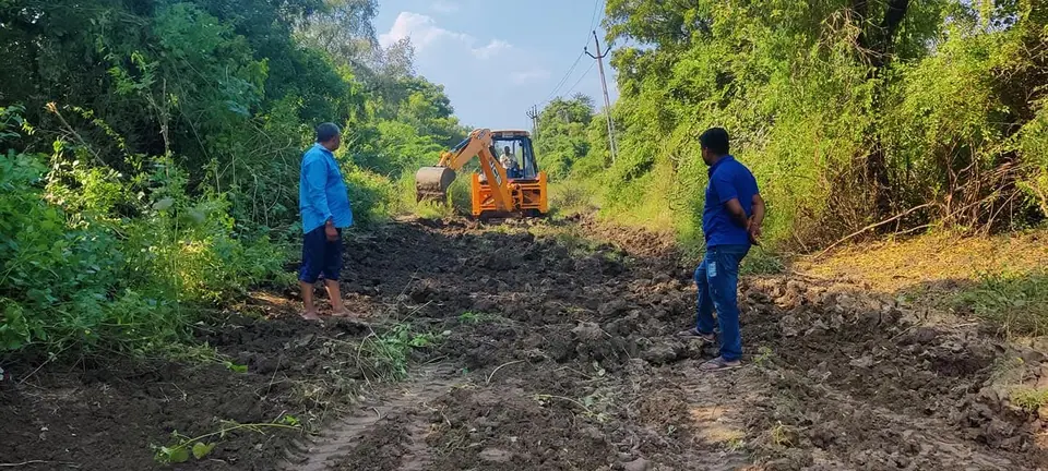 JCB clearing path