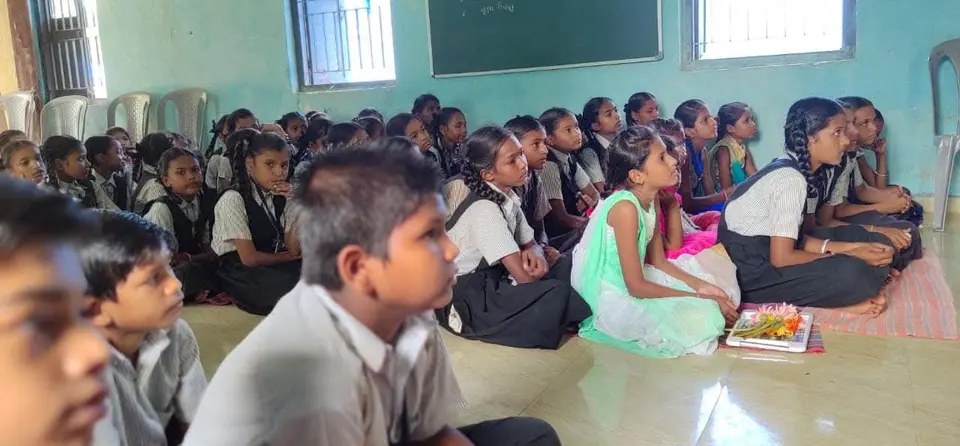 Schoolchildren seated
