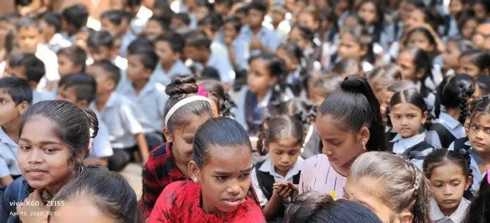 Schoolchildren seated audience