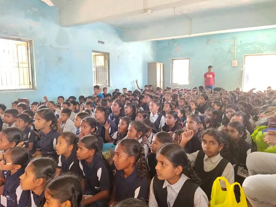 Large school audience in hall