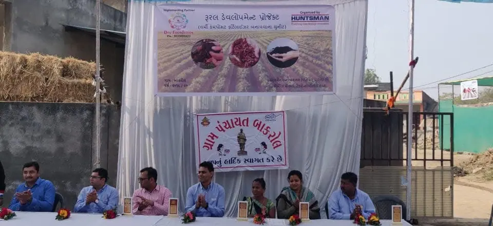 Programme stage with Gram Panchayat Bakrol banner