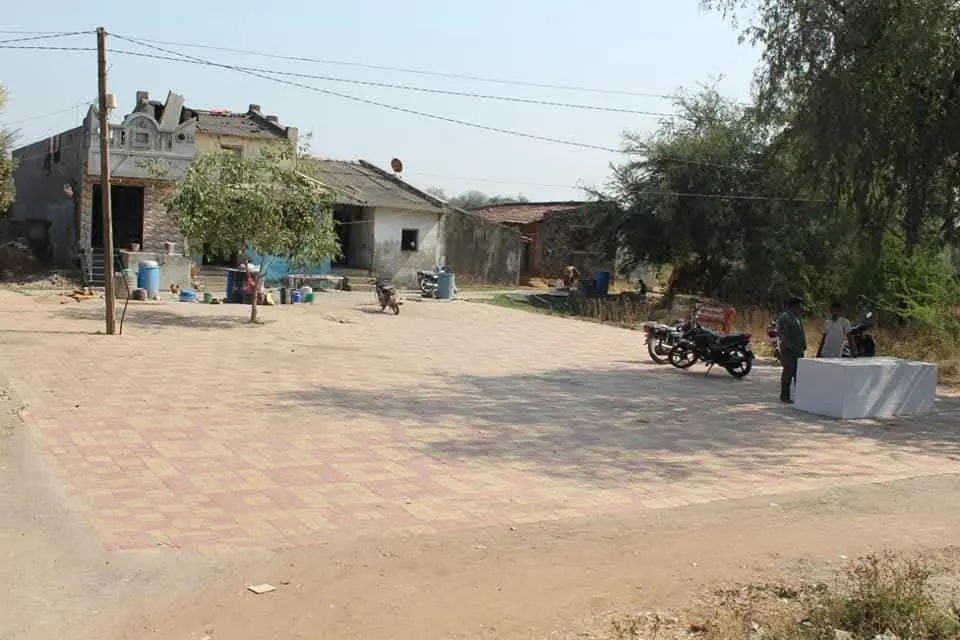 Village square with white block structure